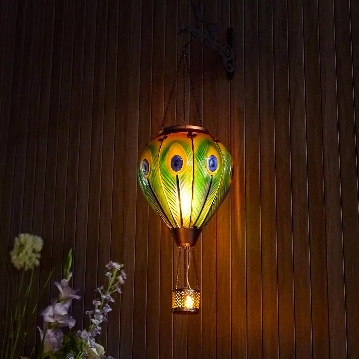 Peacock feather–pattern glass solar balloon lantern for yard decoration, backyard lights, and patio solar décor with flame-effect LED lighting