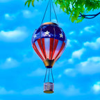 Patriotic hot air balloon solar lantern with American flag design, perfect for backyard decorations and patriotic garden lighting
