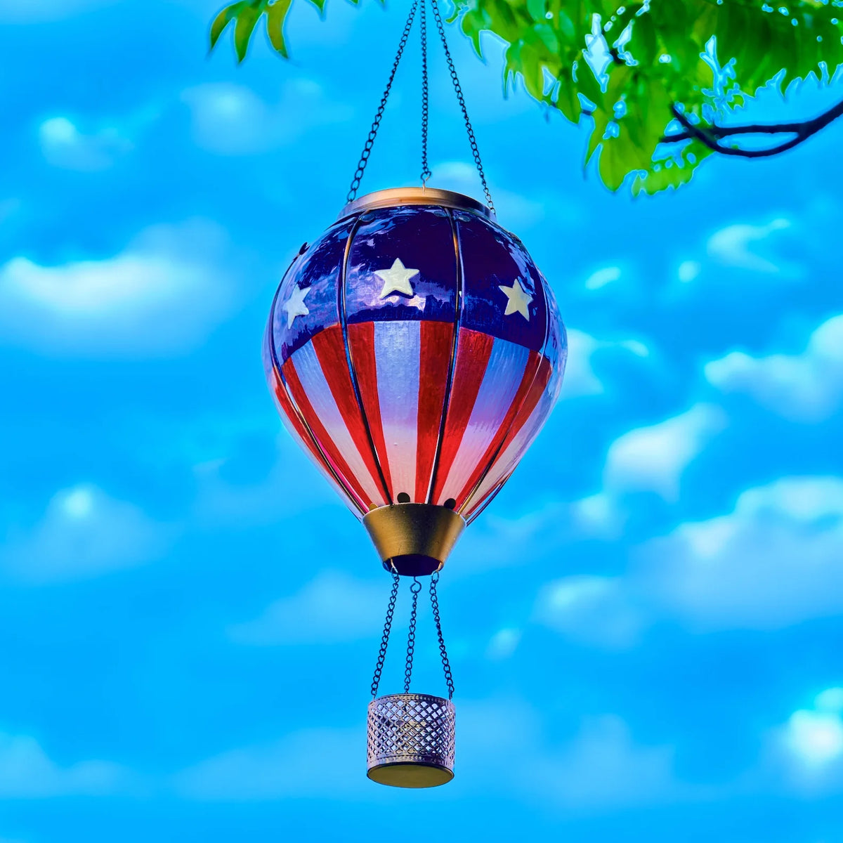 Patriotic hot air balloon solar lantern with American flag design, perfect for backyard decorations and patriotic garden lighting